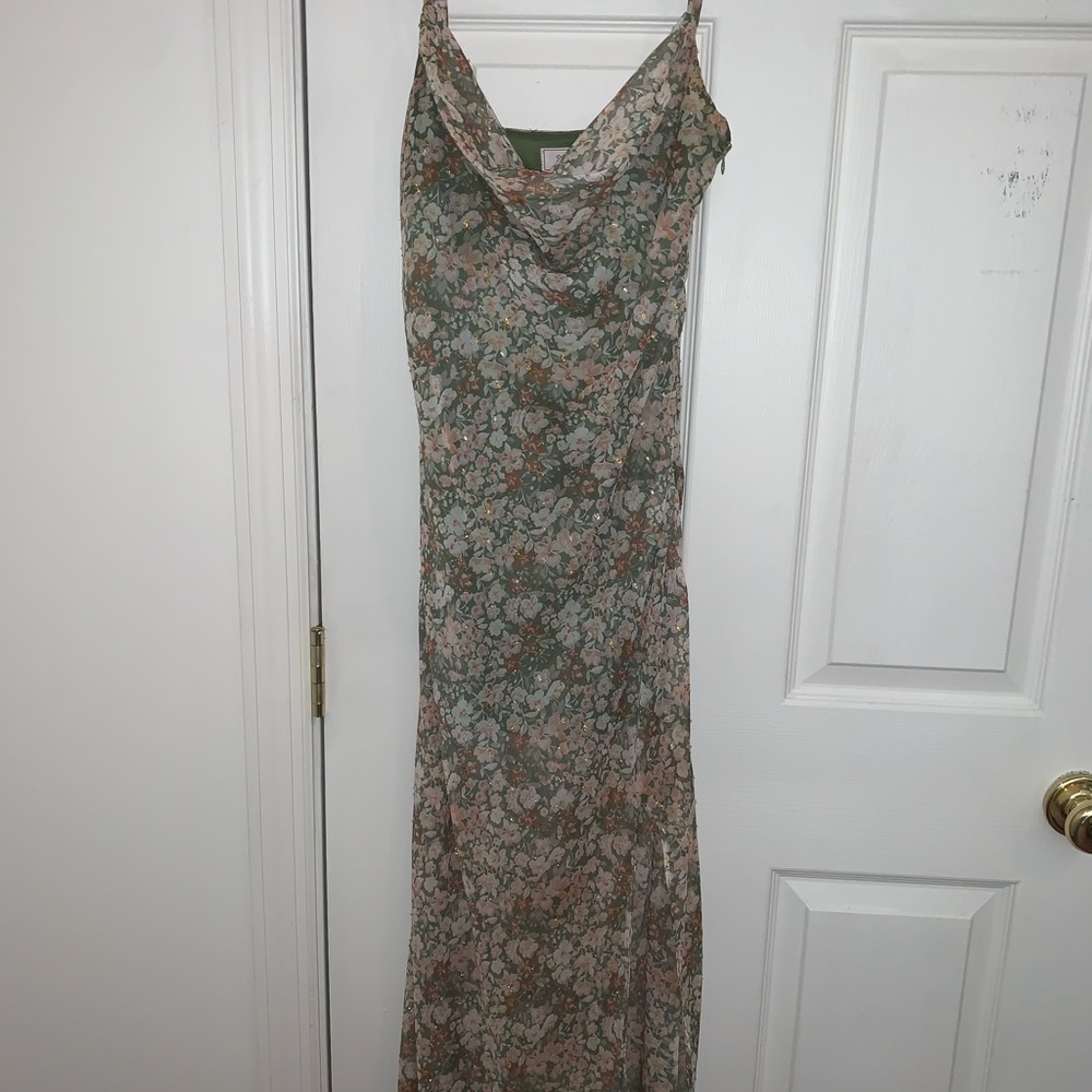 Mid length floral dress.